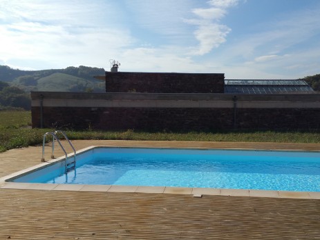 View of the swimming pool with the new buildings in the background